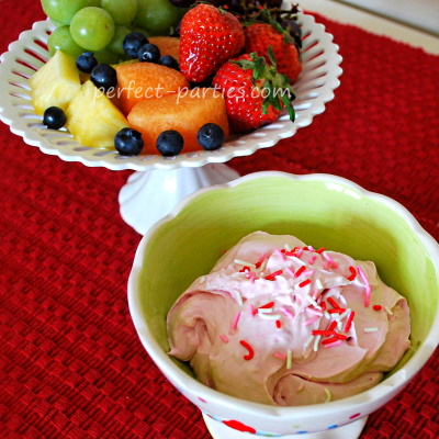 Strawberry fruit dip is a perfect addition to any party menu for kids. Serve with pineapple spears, strawberries and apple slices.