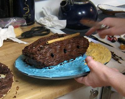 Three Round Cake Halves Are Used to Form the Ship