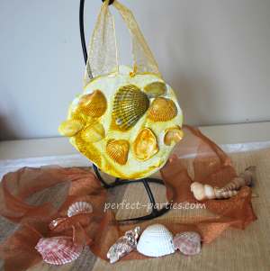 Using plaster of paris and shells, make this cute hanging.